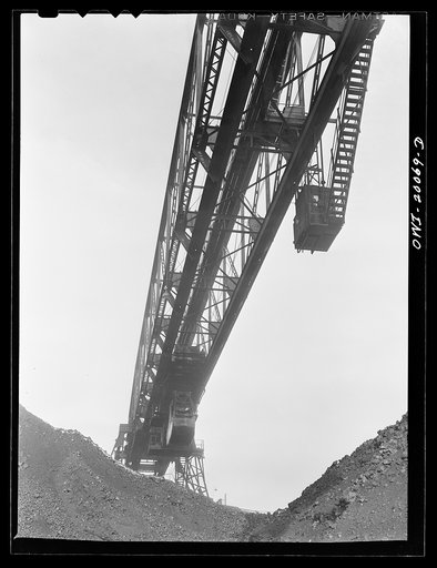 Milwaukee Western Fuel Company, Milwaukee, Wisconsin. One of the bridges at the Seventeenth Street dock of the Milwaukee Western Fuel Company with a five ton coal bucket. The bridge is used for unloading ships, loading cars, keeping coal over the tunnel and loading coal into hoppers
