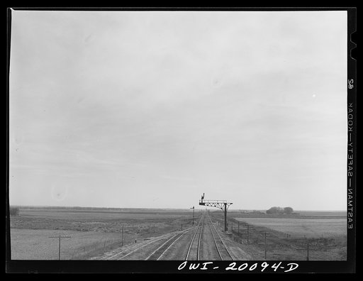 Untitled photo, possibly related to: A railroad siding on the Atchison, Topeka and Santa Fe Railroad enroute to Canadian, Texas