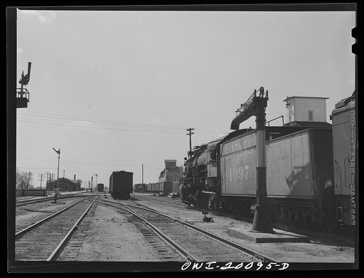 Atchison, Topeka and Santa Fe engine stopping for water enroute to Waynoka, Oklahoma