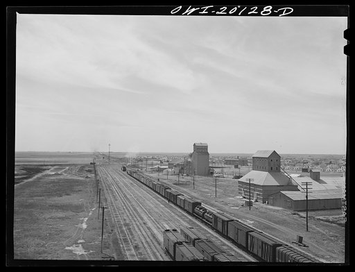 Untitled photo, possibly related to: General view of the city and an Atchison, Topeka and Santa Fe Railroad yard