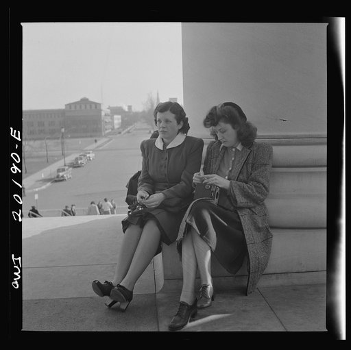 Washington, D.C. Sitting on the steps of the National Gallery of Art on a Sunday afternoon