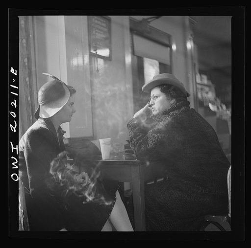 Washington, D.C. Women gossiping in a drugstore over cokes