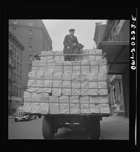 New York, New York. A truckload of sanitary paper cups on Washington Street