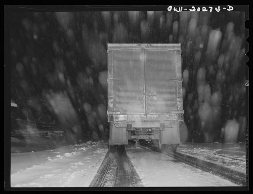 Truck crossing the Blue Ridge Mountains in Tennessee during a snow storm