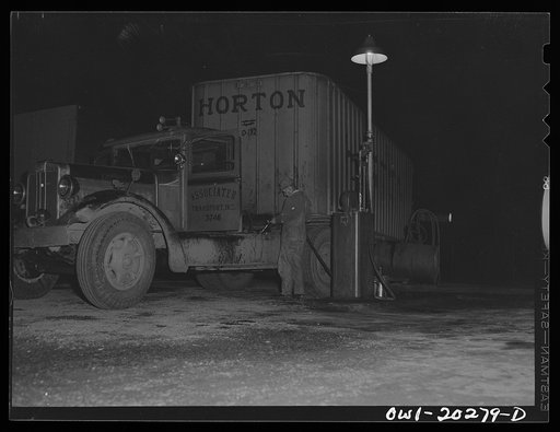 Charlottesville, Virginia. A Baltimore to Burlington truck filling up with gas. This truck has two fifty-gallon tanks and averages about five miles to the gallon
