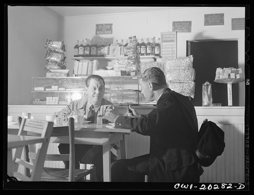 Bob Daugherty and Butch Ryan, truck drivers for Associated Transport Company, having dinner at Mary's Place, ten miles south of Charlottesville, Virginia, on U.S. Highway, Route no. 29