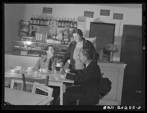 Bob Daugherty and Butch Ryan, truck drivers for Associated Transport Company, having dinner at Mary's Place, ten miles south of Charlottesville, Virginia, on U.S. Highway, Route no. 29