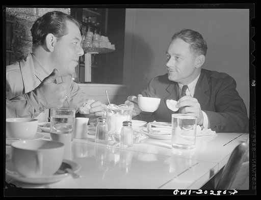 Bob Daugherty and Butch Ryan, truck drivers for Associated Transport Company, having dinner at Mary's Place ten miles south of Charlottesville, Virginia, on U.S. Highway, Route no. 29