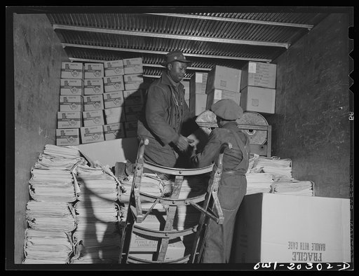 Baltimore, Maryland. Platform workers loading a northbound truck at Davidson truck terminal