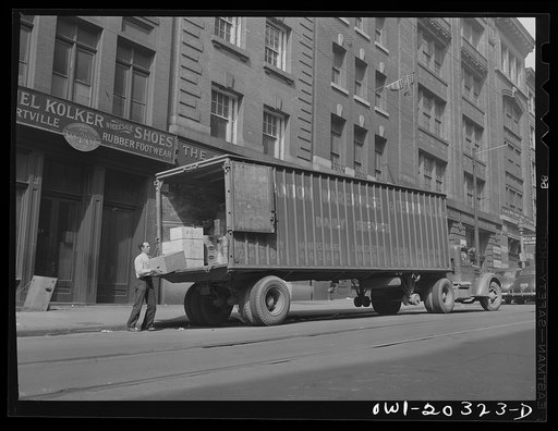 Baltimore, Maryland. Loading a trailer in the wholesale district