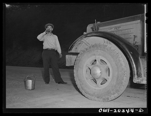 Noah Booher stopping for a Coca-Cola and water for the radiator on U.S. Highway Route no. 11, Virginia
