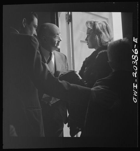Untitled photo, possibly related to: Washington, D.C. Reverend Foot greeting members of his congregation after services at the First Wesleyan Methodist church