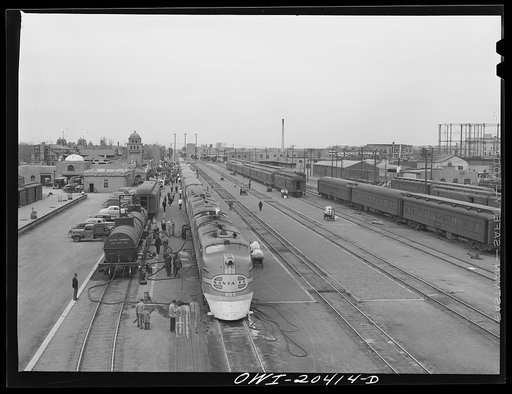 Albuquerque, New Mexico. The Atchison, Topeka and Santa Fe Railroad streamliner "Super Chief" stopping for five minutes' servicing at the depot