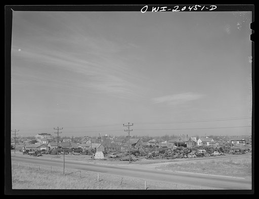 Hereford (vicinity), Texas. Auto junkyard along the Atchison, Topeka and Santa Fe Railroad