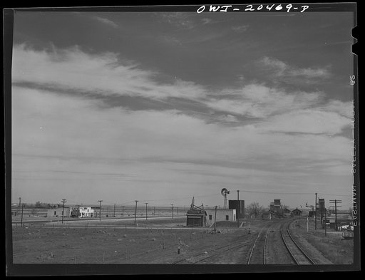 Fort Sumner (vicinity), New Mexico. Passing through a small town on the Atchison, Topeka and Santa Fe Railroad in the Pecos River Valley enroute to Vaughn, New Mexico