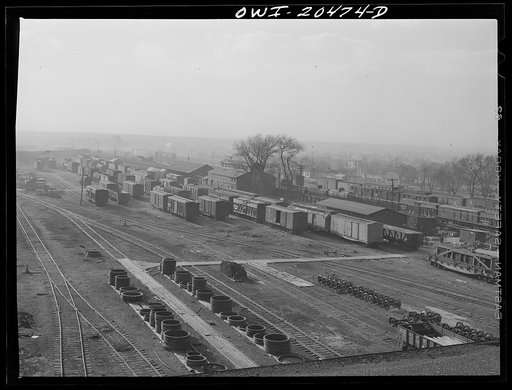 Untitled photo, possibly related to: Sandstorm over a Atchison, Topeka and Santa Fe Railroad yard