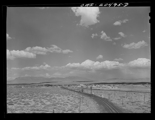 Isleta, New Mexico. Junction of the Atchison, Topeka and Santa Fe coast line tracks with the New Mexico division. In the background is the Isleta Indian Reservation