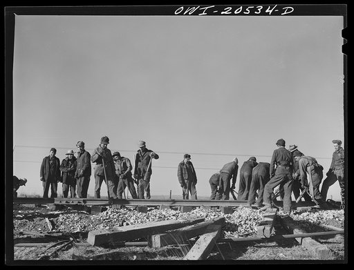 Iden, New Mexico. Atchison, Topeka and Santa Fe Railroad section gang working on a track