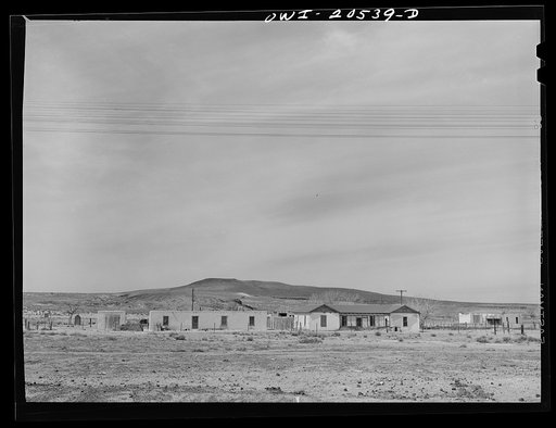 Isleta, New Mexico. Adobe house along the Atchison, Topeka and Santa Fe Railroad