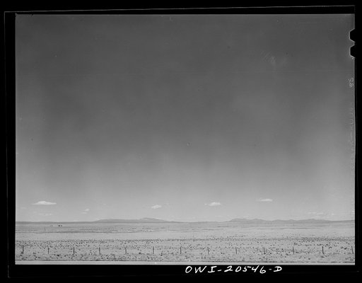 Untitled photo, possibly related to: Vaughn, New Mexico. A passing Southern Pacific Railroad freight train