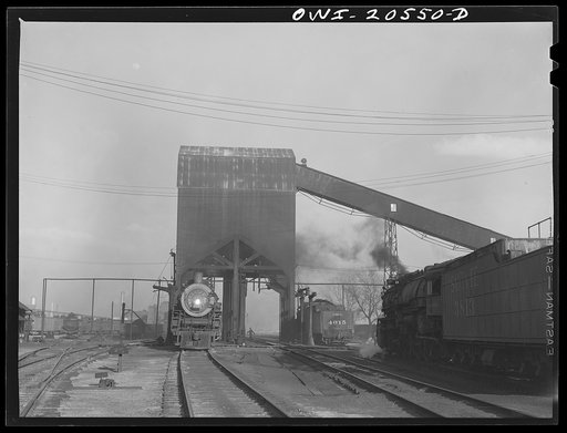 Untitled photo, possibly related to: Clovis, New Mexico. Roundhouse and coal chute on the Atchison, Topeka and Santa Fe Railroad