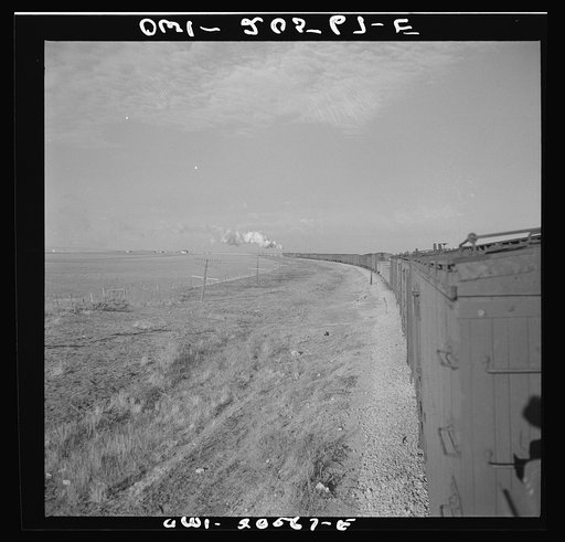 Untitled photo, possibly related to: Dawn, Texas. Crossing Texas wheat country along the Atchison, Topeka, and Santa Fe Railroad between Amarillo, Texas and Clovis, New Mexico