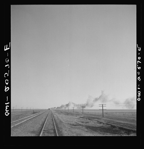 Untitled photo, possibly related to: Dawn, Texas. Crossing Texas wheat country along the Atchison, Topeka, and Santa Fe Railroad between Amarillo, Texas and Clovis, New Mexico