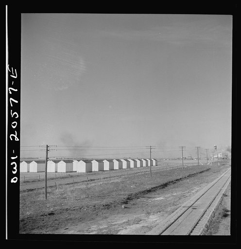 Untitled photo, possibly related to: Hereford, Texas. Grain storage bins on the Atchison, Topeka, and Santa Fe Railroad between Amarillo, Texas and Clovis, New Mexico