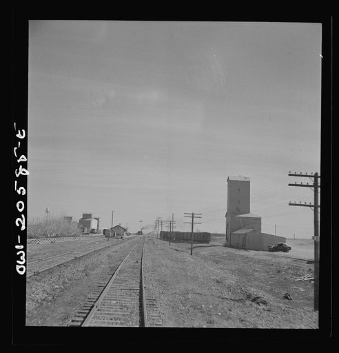 Untitled photo, possibly related to: Friona, Texas. Going through the town on the Atchison, Topeka, and Santa Fe Railroad between Amarillo, Texas and Clovis, New Mexico