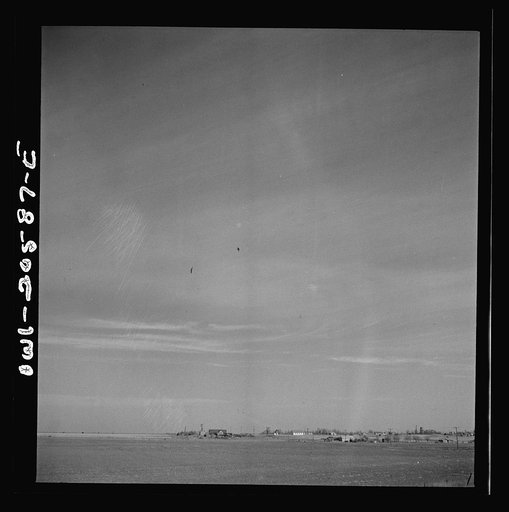 Untitled photo, possibly related to: Friona, Texas. Going past the town on the Atchison, Topeka and Santa Fe Railroad between Amarillo, Texas and Clovis, New Mexico