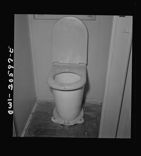 Clovis, New Mexico. Toilet of a new caboose on the Atchison, Topeka and Santa Fe Railroad