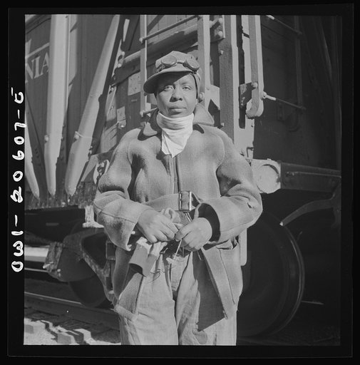 Clovis, New Mexico. Abbie Caldwell, employed in the Atchison, Topeka and Santa Fe Railroad yard to clean potash cars