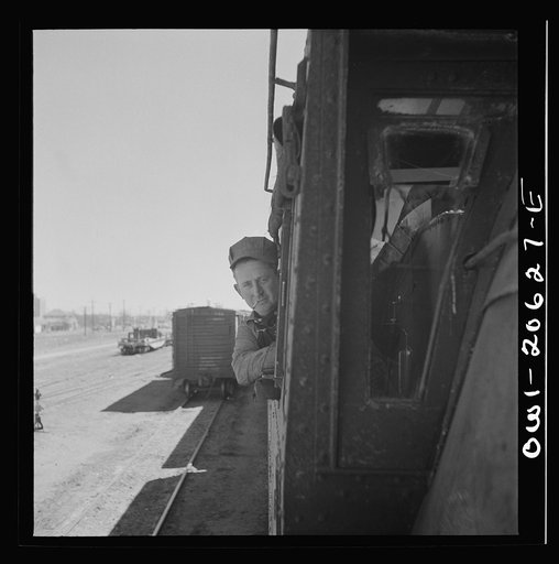Clovis, New Mexico. D.L. Clark, engineer, ready to start his locomotive out of the Atchison, Topeka and Santa Fe Railroad yard