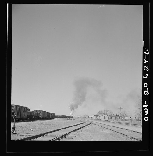 Clovis, New Mexico. Westbound freight train leaving the Atchison, Topeka and Santa Fe Railroad