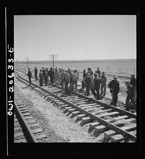 Clovis, New Mexico. Passing a section gang at work on the outskirts along the Atchison, Topeka, and Santa Fe Railroad between Clovis and Vaughn, New Mexico