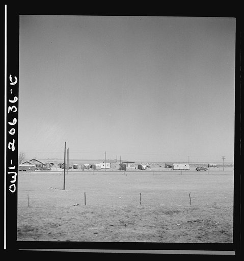 Grier, New Mexico. Passing through the town on the Atchison, Topeka, and Santa Fe Railroad. Trailers occupied by the workers from a nearby war plant