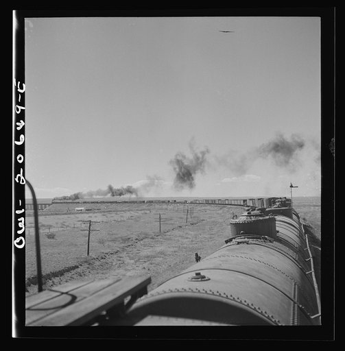 Fort Sumner, New Mexico. Train about to cross Pecos River along the Atchison, Topeka, and Santa Fe Railroad between Clovis and Vaughn, New Mexico