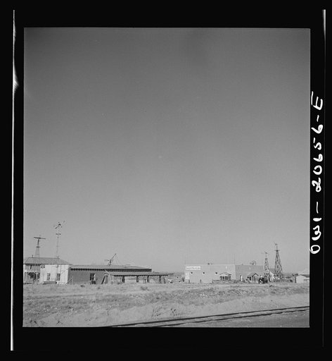Untitled photo, possibly related to: Grier, New Mexico. Passing through the town on the Atchison, Topeka, and Santa Fe Railroad. Trailers occupied by the workers from a nearby war plant
