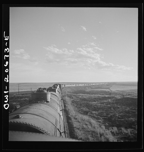 Duoro, New Mexico. Rounding a curve in the sheep and cattle country along the Atchison, Topeka, and Santa Fe Railroad between Clovis and Vaughn, New Mexico