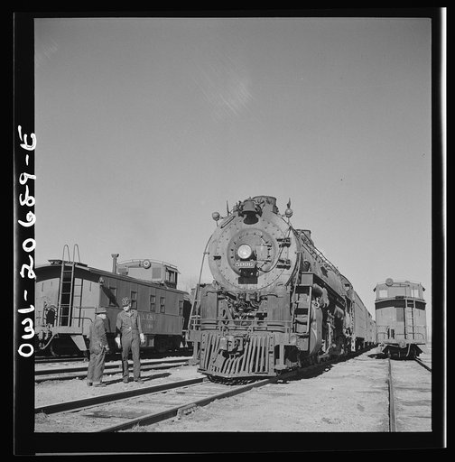 Vaughn, New Mexico. Easternbound train about to leave the Atchison, Topeka and Santa Fe Railroad yard on the return trip