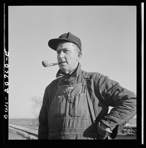Iden, New Mexico. A.E. Janes, foreman of a section crew working on the track in the Atchison, Topeka and Santa Fe Railroad yard