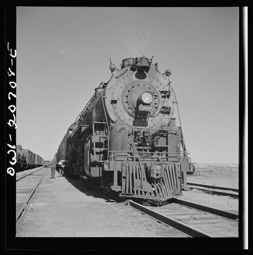 Vaughn, New Mexico. The Atchison, Topeka and Santa Fe Railroad meets the Southern Pacific Railroad as the streamliner passes near the town