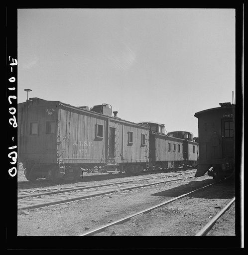 Vaughn, New Mexico. A caboose on the Atchison, Topeka and Santa Fe Railroad yard converted from an old box car