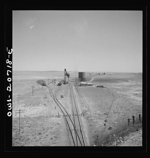 Vaughn, New Mexico. Passing the Southern Pacific Railroad station along the Atchison, Topeka and Santa Fe Railroad between Vaughn and Belen, New Mexico
