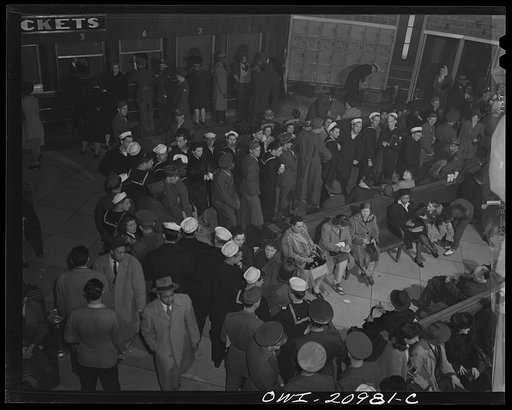 Washington, D.C. Service men and civilians waiting for a bus at the Greyhound bus terminal