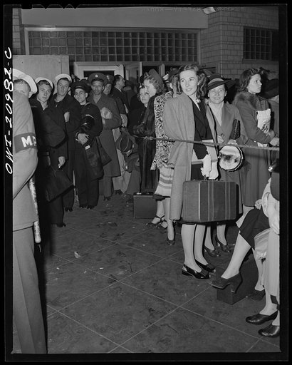 Washington, D.C. Service men waiting for a bus at the Greyhound bus terminal
