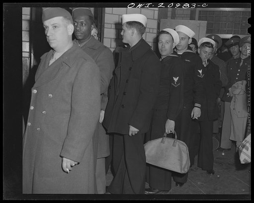 Washington, D.C. Service men waiting for a bus at the Greyhound bus terminal