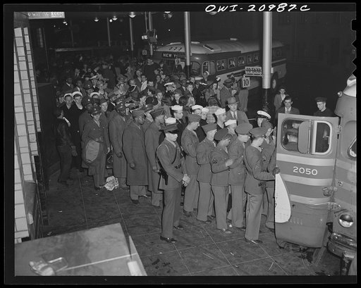 Washington, D.C. Crowd waiting to board a bus at the Greyhound bus terminal