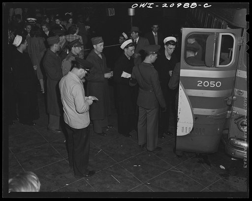 Washington, D.C. Servicemen boarding a bus at the Greyhound bus terminal