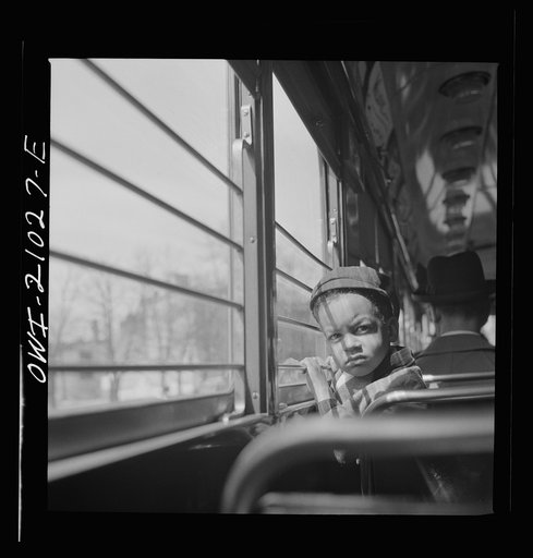 Washington, D.C. Little boy riding on a streetcar